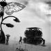 Mutant vehicles in black rock city durind sandstorm.  A Mutant Vehicle is an art car classification specifically created for use at Black Rock City and they are  the only vehicles which can run during the festival