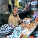 An egg seller in a traditional market street of Hong Kong island