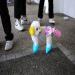 Un chien color avec des teintures fluorescentes se promne  Hong Kong. Il faut acheter une license pour avoir un animal domestique en Chine ce qui en fait un nouveau signe extrieur de richesse et de plus en plus de chinois riches ont des animaux domestiques qu